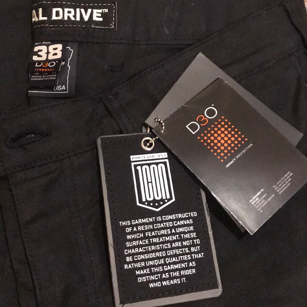 ICON - tags on, black riding pants (waist 38)